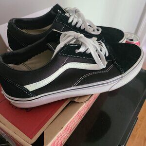 Black any white traditional old skool vans